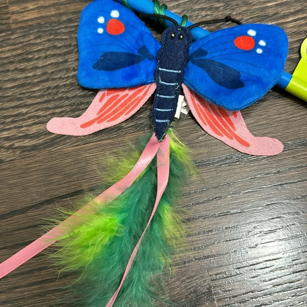 Leaps & Bounds butterfly w feather